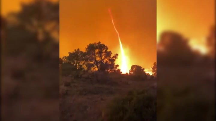 'Firenado' rages in up-close footage as wildfires spread to Nevada