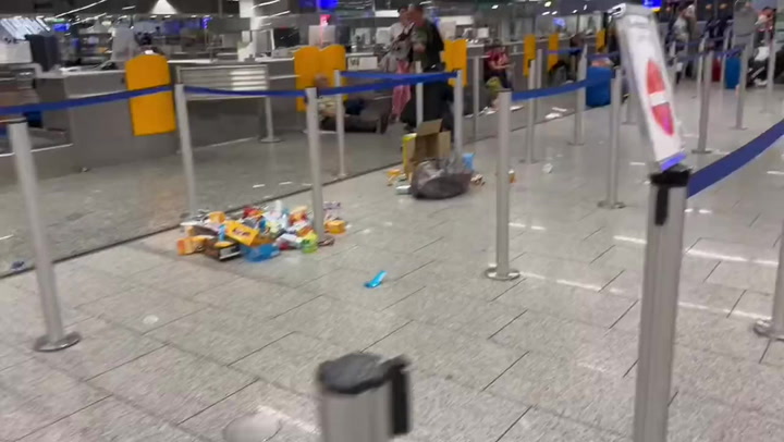Rubbish scattered in Frankfurt airport after flooding prompts flight cancellations