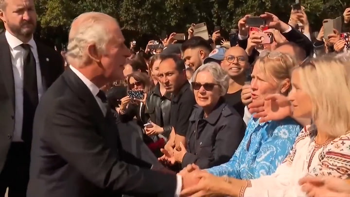 King Charles greets well-wishers outside Buckingham Palace