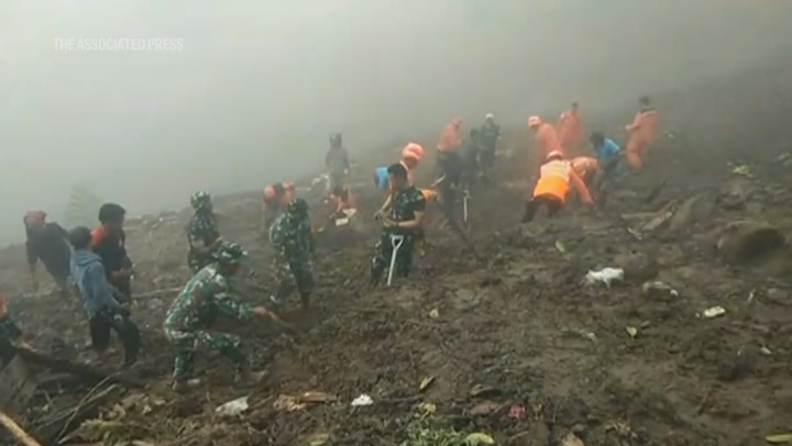 Search teams dig through debris after deadly landslides hit Indonesia's Sulawesi island
