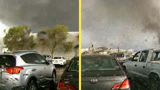Dashcam captures moment powerful tornado bulldozes entire building