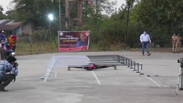Teenager breaks world record for quickest 'limbo skate'