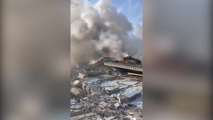 Video appears to show fire and smoke after Russian attack on a school in Mykolaiv