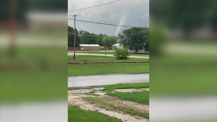 Terrifying tornado tears towards houses in Iowa
