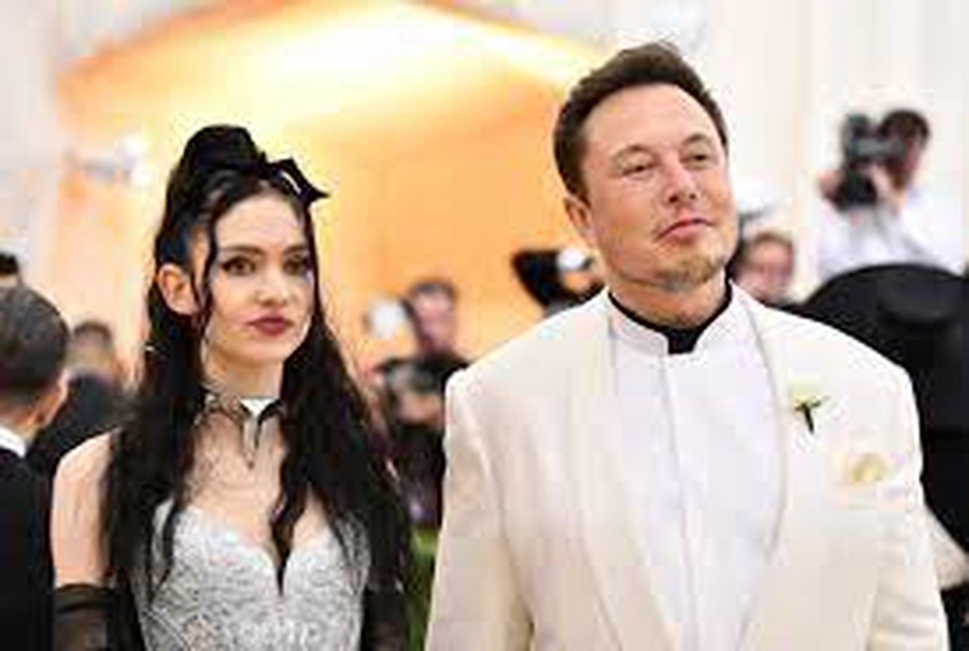 OMG, LISTEN TO THIS: Grimes drops 'Player Of Games' video about her  relationship with Elon Musk 