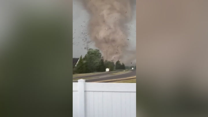 Massive tornado sends debris flying through Indiana
