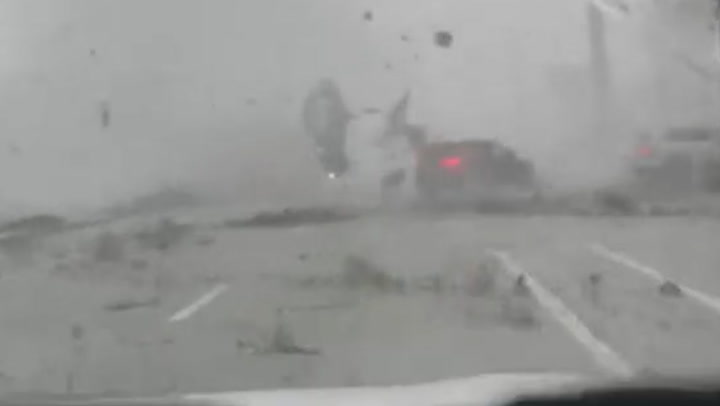 Moment Florida tornado flips car in dramatic dashcam footage