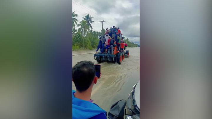 Tractor evacuation saves stranded residents from Davao City floods