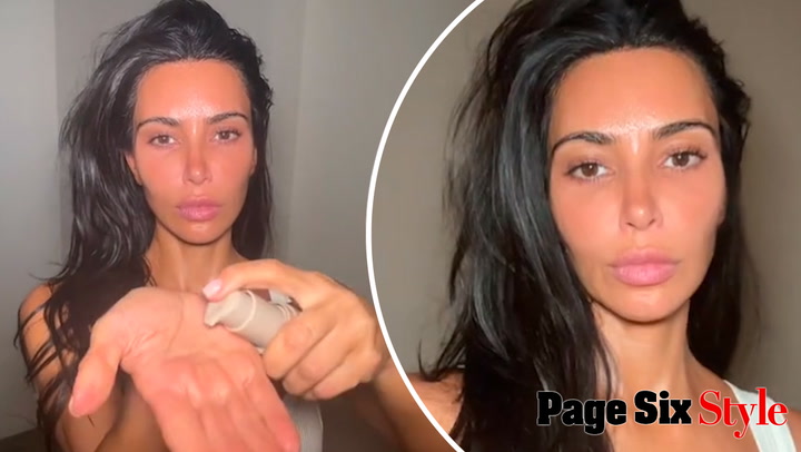 Kim Kardashian appears on TikTok makeup-free and says, “Feeling myself.”