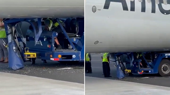 LaGuardia Airport tug driver stuck underneath plane after towing incident