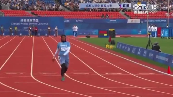 Somali runner skips over finish line of 100m sprint race