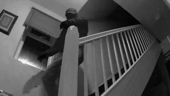 Family on holiday watch burglars ransack home on nanny cam