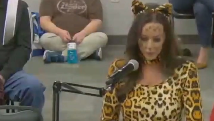 Mom dresses as giant cat at school board meeting in weird 'woke' protest