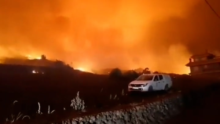 Tenerife residents evacuated as firefighters tackle wildfires through night
