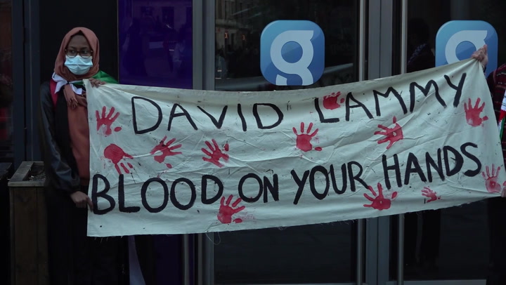 Residents protest outside LBC following David Lammy's comments on Gaza refugee camp airstrike