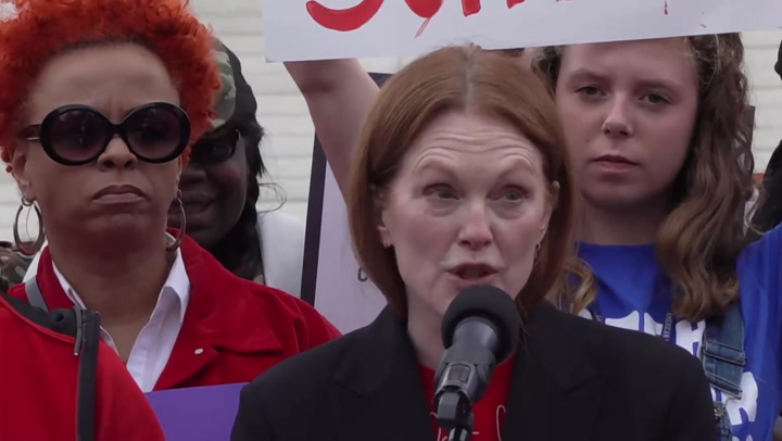 Actress Julianne Moore joins gun control rally as Supreme Court votes on 1994 federal law