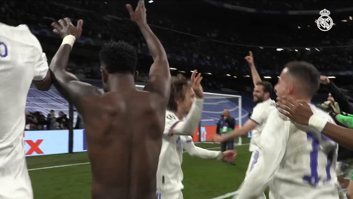 Real Madrid players celebrate with the fans