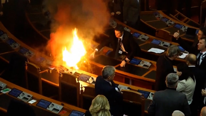 Albanian opposition MPs set off flares in parliament