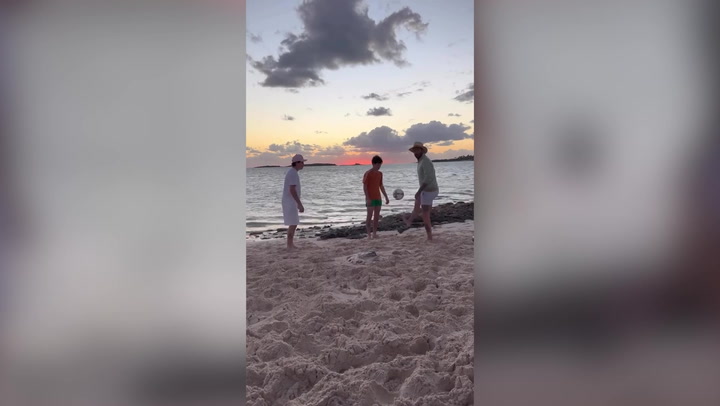 Victoria Beckham shares family Bahamas Christmas holiday as David plays football on beach