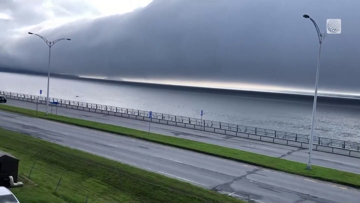 PHOTOGRAPHERS STUNNED BY MASSIVE APOCALYPTIC-LOOKING CLOUD IN QUEBEC