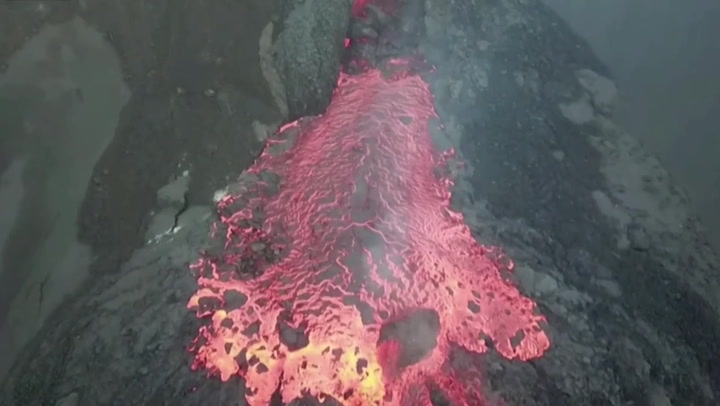 Lava streams down from La Palma volcano