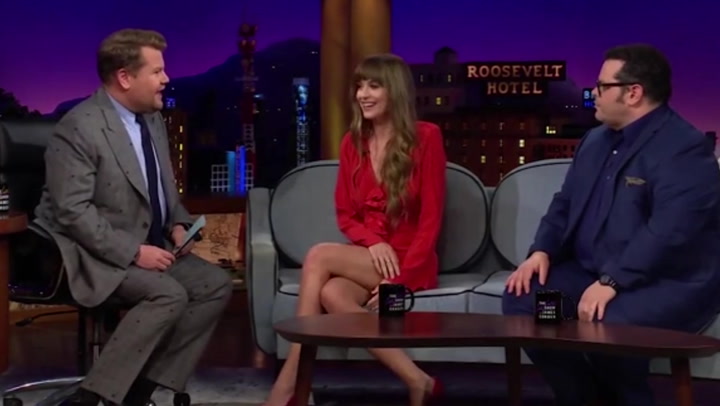 James Corden offers Dakota Johnson his jacket to cover up her legs on show