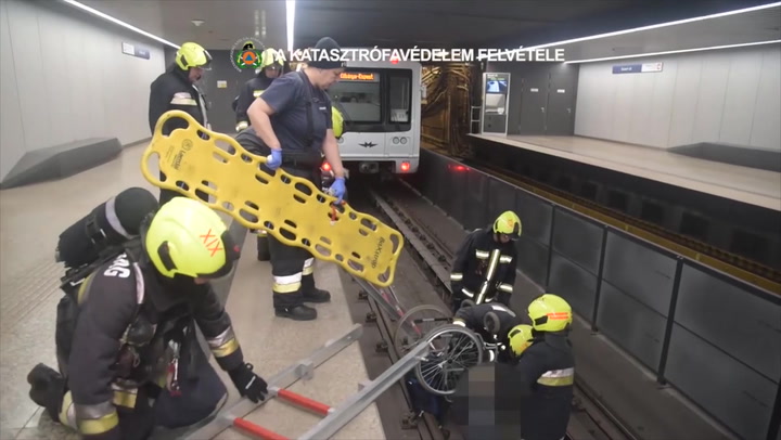 Wheelchair user rescued after falling onto train tracks