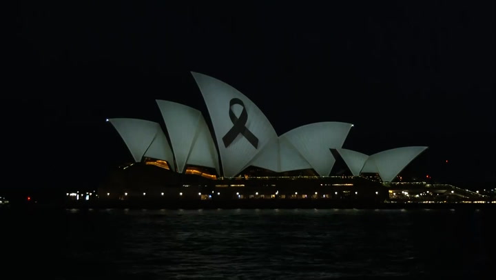 Sydney Opera House illuminated with black ribbon for mall stabbing victims