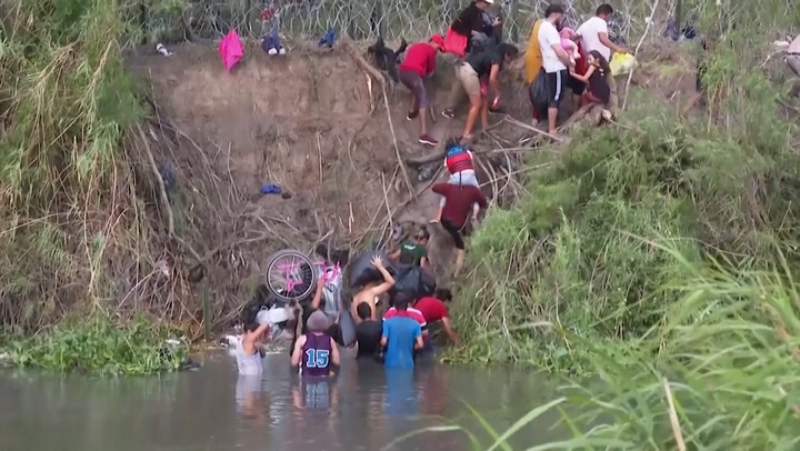 Migrants rush to cross Rio Grande hours before pandemic-related asylum restrictions end