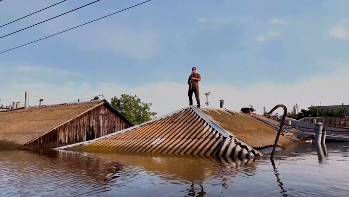 Saxophonist plays on rooftops of flooded Kherson homes after Nova Kakhovka dam attack