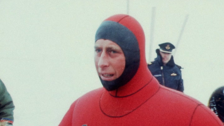 Prince Charles comically deflates thick scuba diving suit in rare documentary footage
