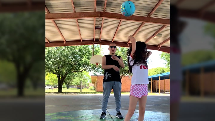 'Father-Daughter Duo Slays EPIC Basketball Trick Shot
'