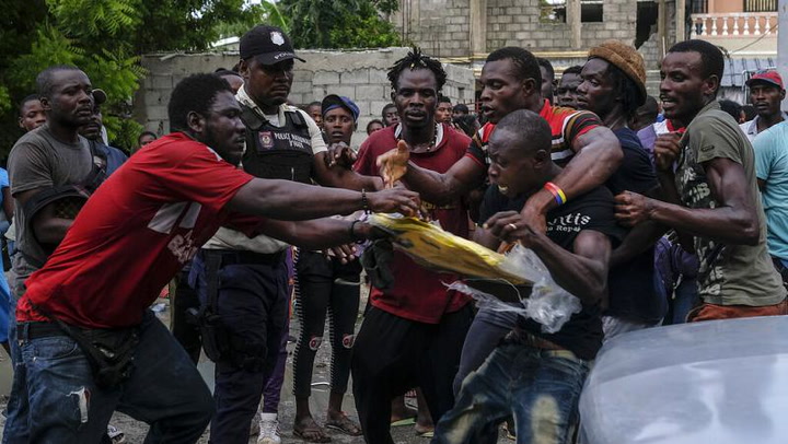 Fighting breaks out over aid distribution after Haiti earthquake