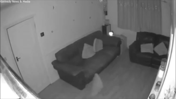 Sofa cushion thrown off sofa by 'ghost'