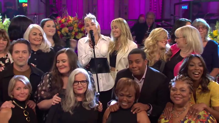 Miley Cyrus gives shout out to 'my godmother' Dolly Parton on SNL