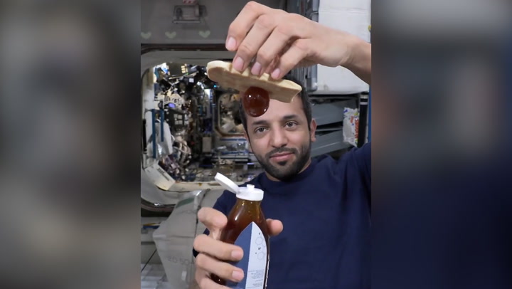 Astronaut shows how honey reacts in zero gravity in video of him making snack in space