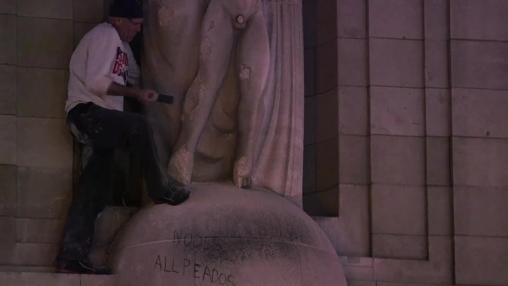 Man scales BBC to destroy Eric Gill statue with hammer