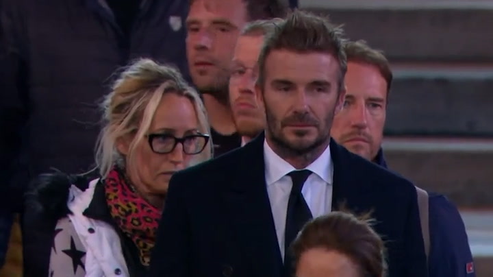 David Beckham enters Westminster Hall to see the Queen lying-in-state
