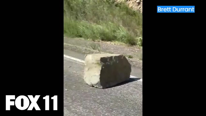Boulders fall on California freeway after earthquake