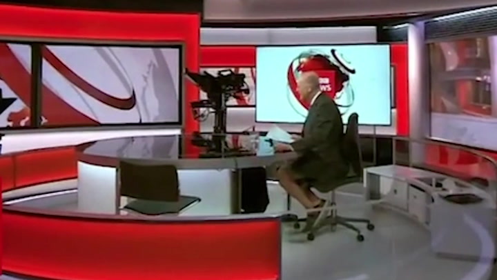 BBC anchor caught wearing shorts under desk as he presents news live