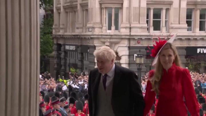 Johnson met with boos and cheers as he arrives at St Paul's