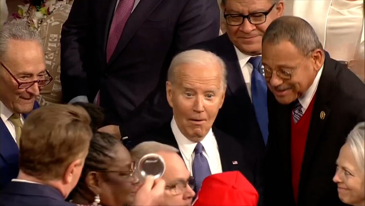 President Biden reacts to Marjorie Taylor Greene’s MAGA hat at State of the Union
