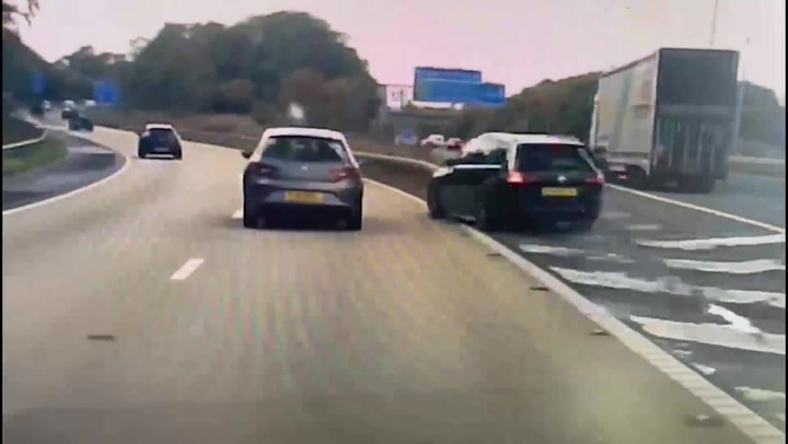 Driver cheats death after making terrifying last-minute turn across motorway