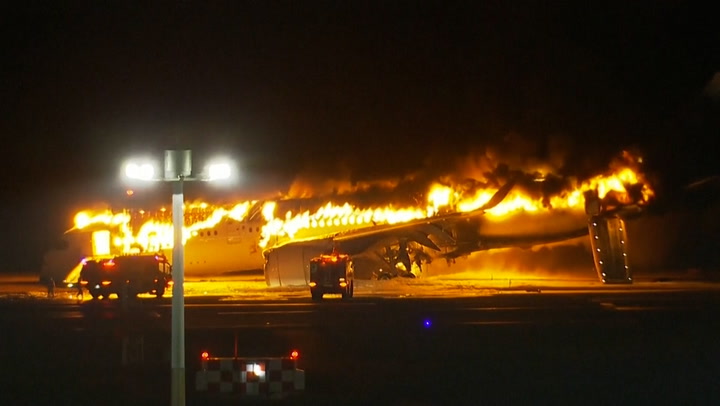 Japan Airlines jet bursts into flames on Tokyo's Haneda airport runway