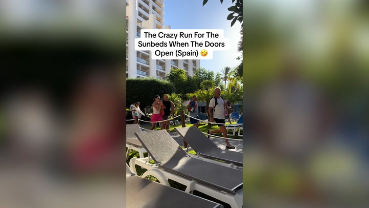 Tourists sprint to secure sunbeds at Benidorm hotel-.mp4
