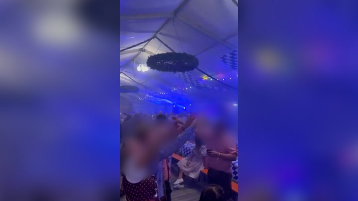Video appears to show group performing Hitler salutes at Oktoberfest