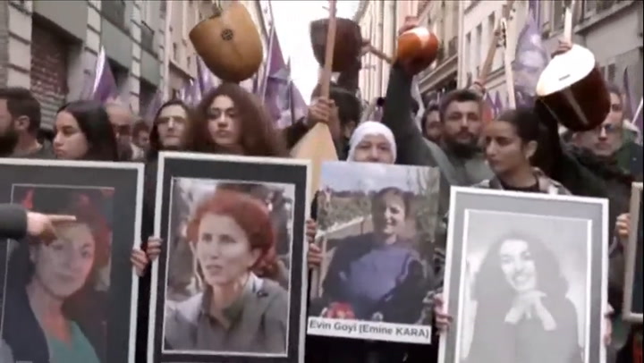 Kurdish community pay tribute to three people killed in shooting at cultural centre in Paris