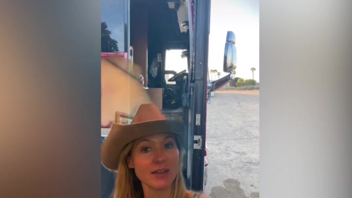 Singer Jewel shows damage to her tour bus after it caught fire