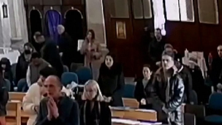 CCTV shows terrifying moment two masked gunmen enter church in Istanbul