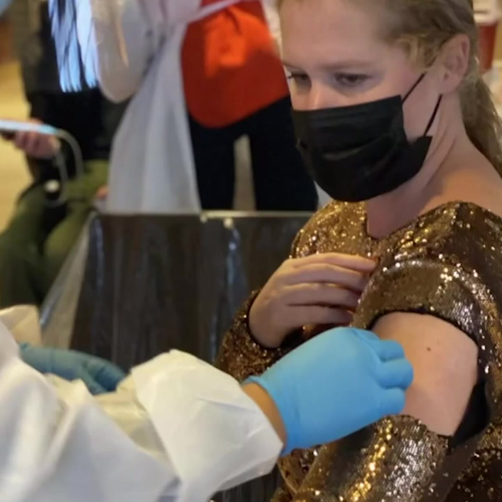 Amy Schumer shares celebratory vaccine video wearing her 'fanciest dress'